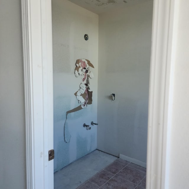 bathroom with tile patterned flooring