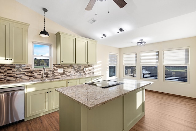 kitchen with dishwasher, a center island, sink, light hardwood / wood-style flooring, and pendant lighting