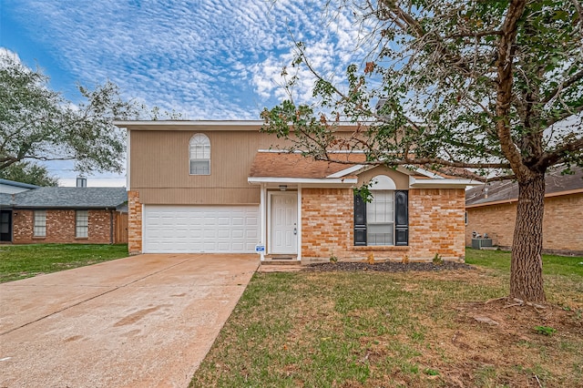 view of front of house featuring a garage, a front lawn, and cooling unit