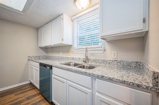 kitchen with dark hardwood / wood-style flooring, a textured ceiling, sink, dishwasher, and white cabinetry