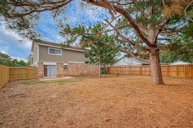 rear view of house featuring a patio area