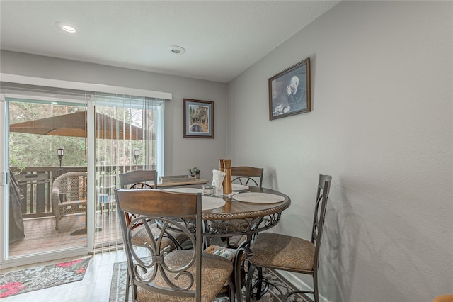 dining space featuring light hardwood / wood-style floors