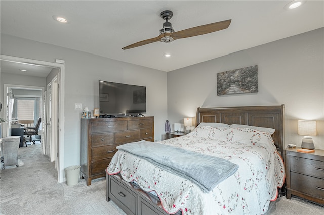 carpeted bedroom featuring ceiling fan