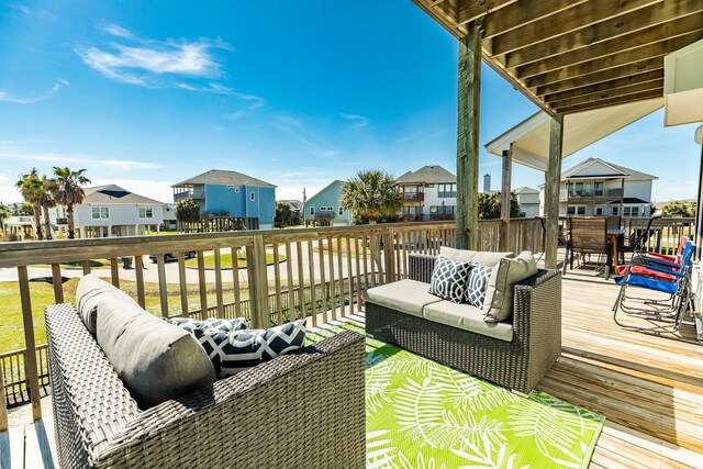 wooden deck with an outdoor hangout area