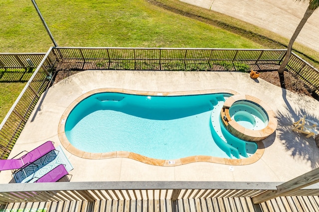 view of pool featuring an in ground hot tub