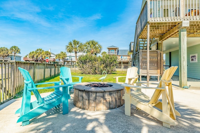 view of patio with a fire pit