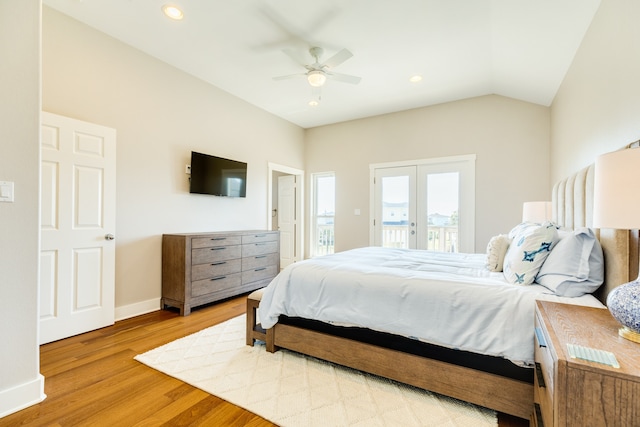 bedroom featuring lofted ceiling, french doors, ceiling fan, access to exterior, and light hardwood / wood-style floors