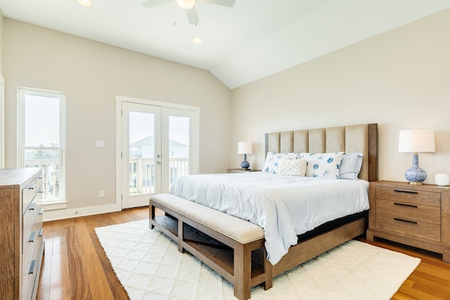 bedroom with ceiling fan, french doors, light hardwood / wood-style flooring, lofted ceiling, and access to outside