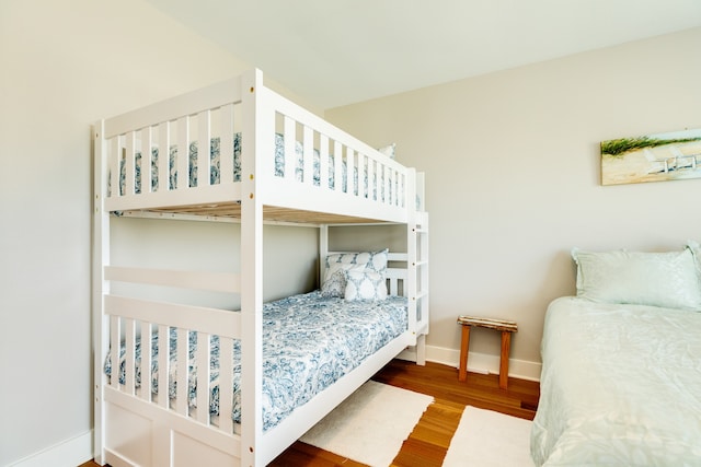 bedroom with hardwood / wood-style floors