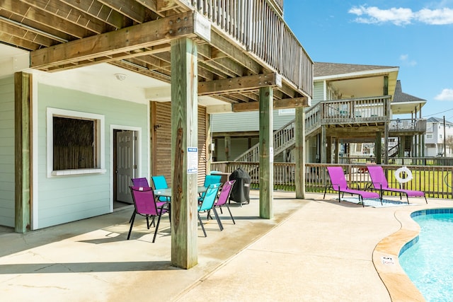 view of patio / terrace featuring a community pool