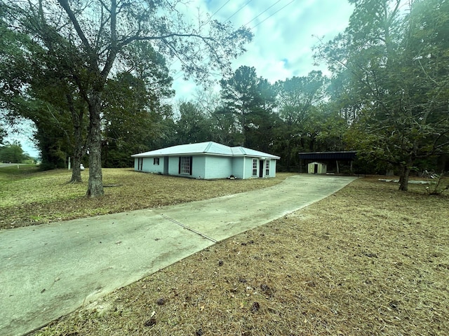 view of home's community with a lawn