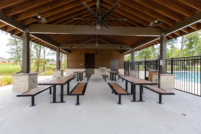 view of patio / terrace featuring ceiling fan