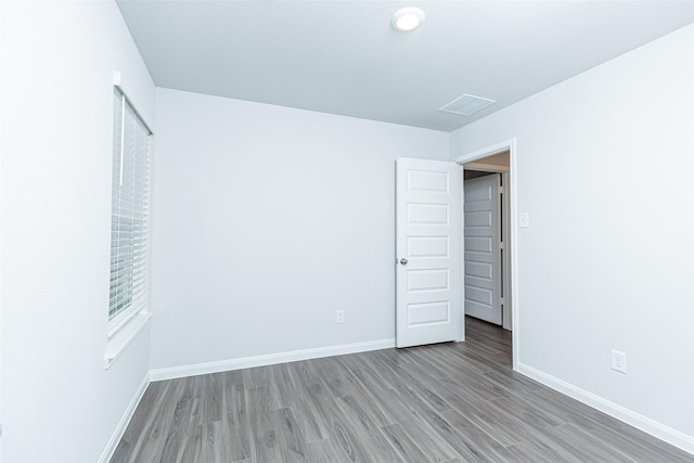 unfurnished bedroom featuring light wood-type flooring