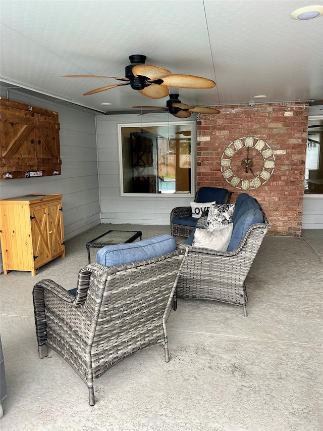 view of patio / terrace featuring ceiling fan