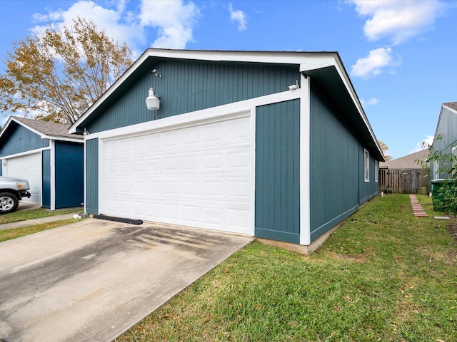 garage with a lawn