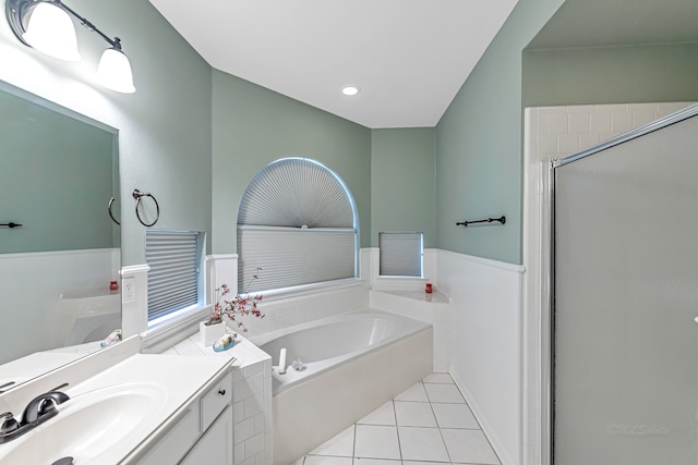 bathroom featuring tile patterned flooring, vanity, and independent shower and bath