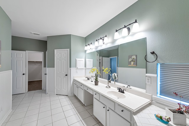 bathroom featuring tile patterned floors and vanity