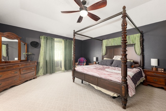 bedroom featuring ceiling fan and carpet floors