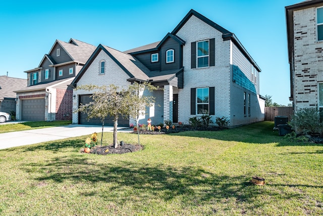 view of front of house with a front lawn and a garage