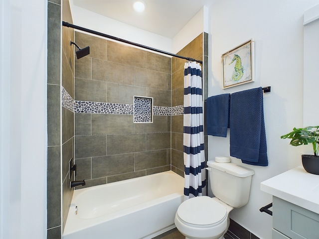 full bathroom featuring vanity, toilet, and shower / bath combo with shower curtain