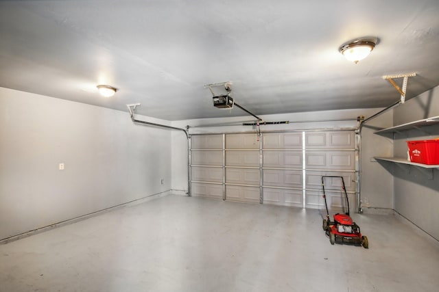 garage featuring a garage door opener