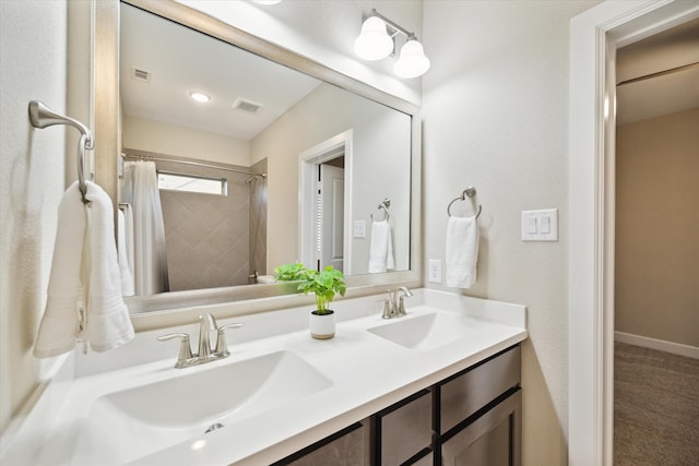 bathroom with vanity and walk in shower