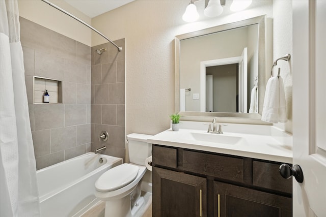 full bathroom featuring vanity, toilet, and shower / bathtub combination with curtain