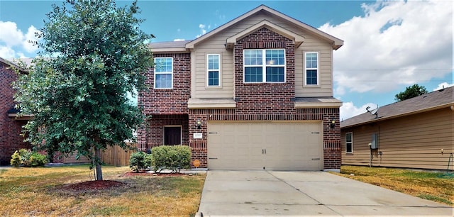 view of front of home with a garage and a front lawn