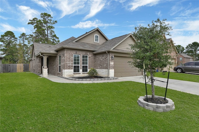 view of front of house with a front lawn and a garage