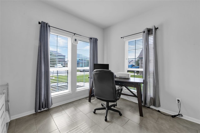 office with light tile patterned floors