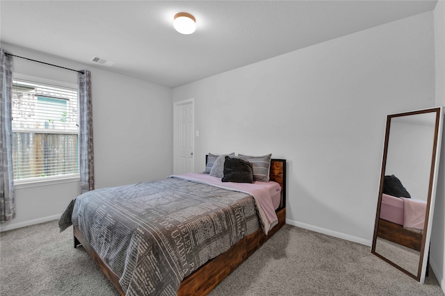 bedroom featuring carpet