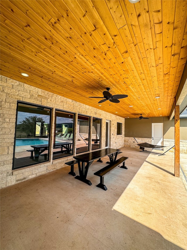 view of patio featuring ceiling fan