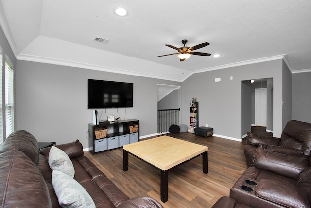 living room featuring ceiling fan, wood-type flooring, and crown molding