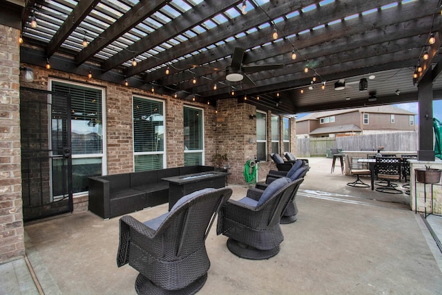 view of patio featuring an outdoor hangout area, ceiling fan, and a pergola