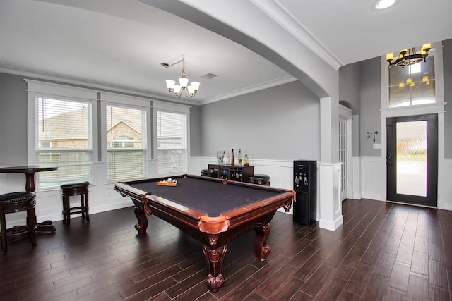 playroom featuring plenty of natural light, billiards, dark hardwood / wood-style floors, and ornamental molding