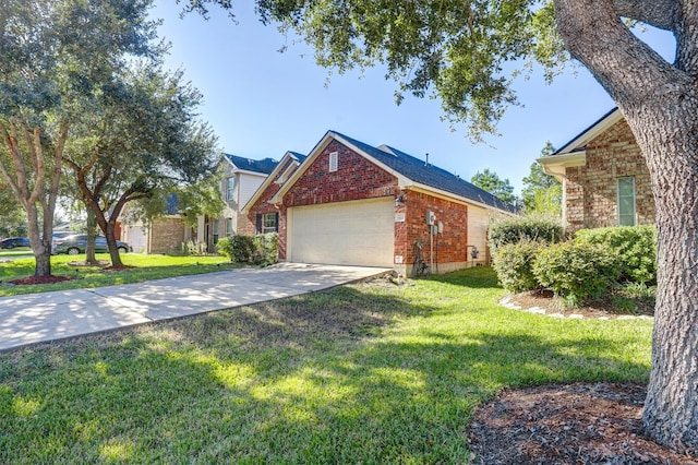 view of front of property featuring a front yard and a garage