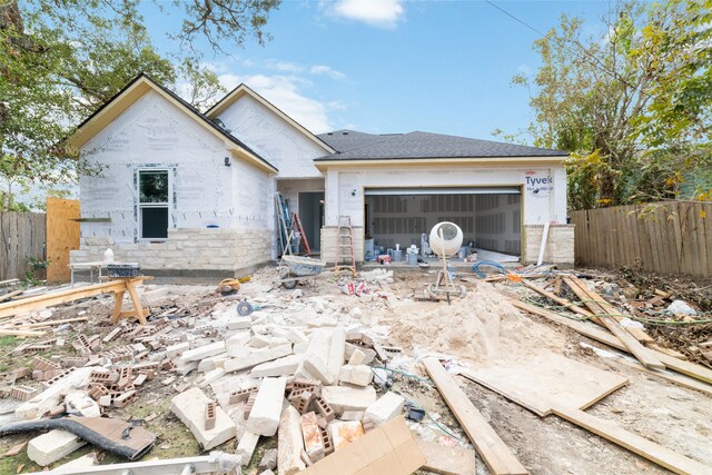 property in mid-construction featuring a garage