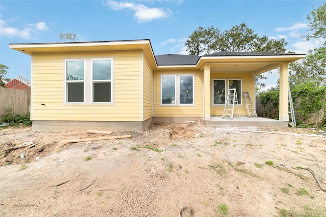 rear view of house with a patio