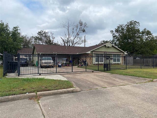 ranch-style home with a garage and a front lawn