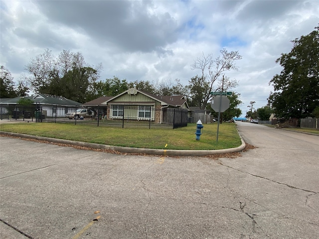 view of front of home with a front lawn