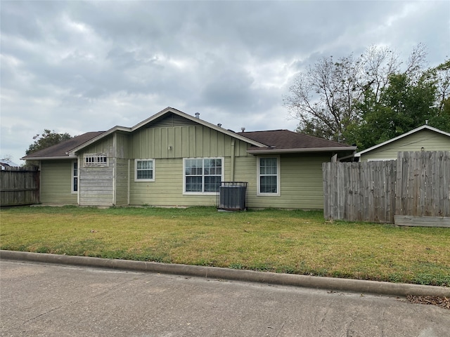 view of property exterior with a yard