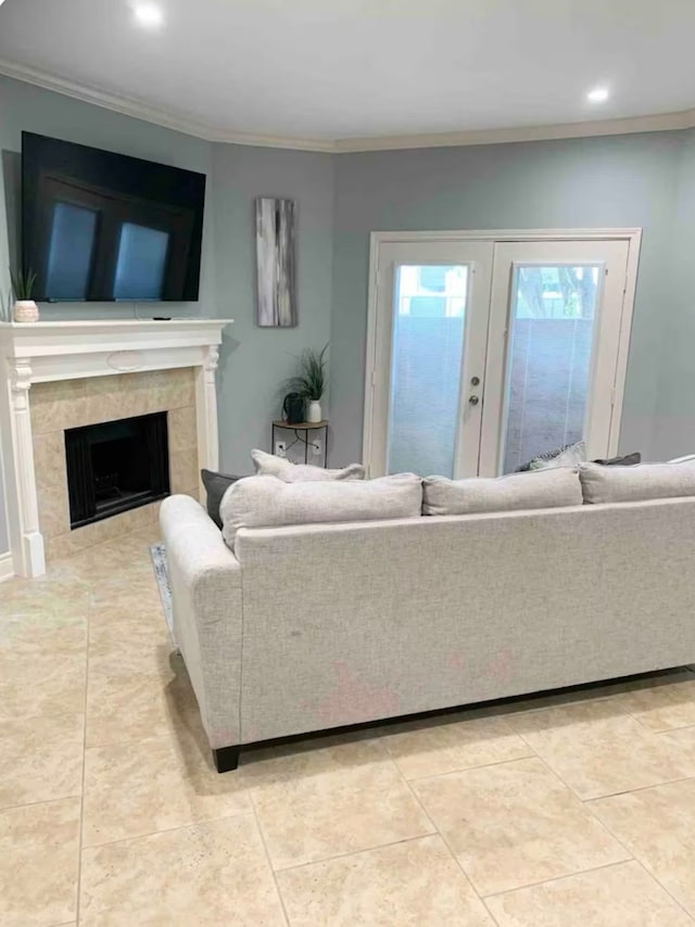 tiled living room featuring a fireplace and ornamental molding