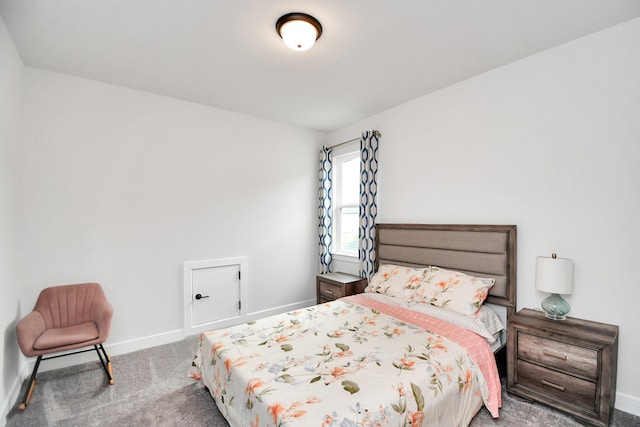 bedroom featuring light colored carpet