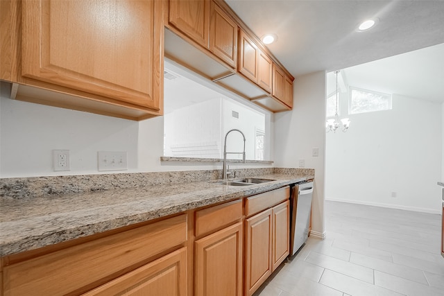 kitchen with dishwasher, sink, light stone countertops, and a notable chandelier