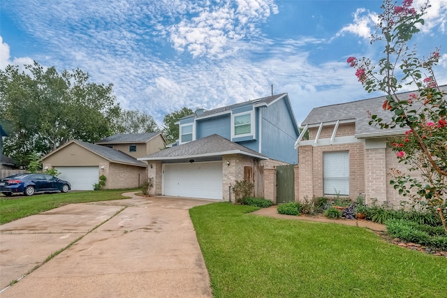 view of front facade with a garage and a front lawn