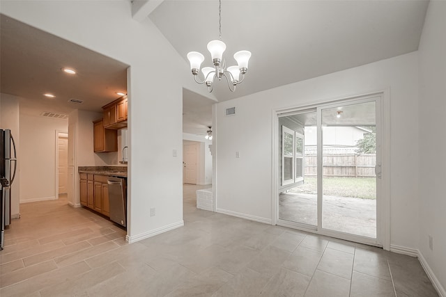 kitchen featuring pendant lighting, ceiling fan with notable chandelier, stainless steel dishwasher, and lofted ceiling