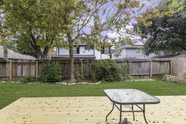 view of yard featuring a wooden deck