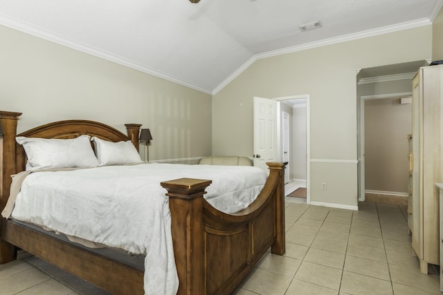 bedroom with light tile patterned floors, vaulted ceiling, and ornamental molding