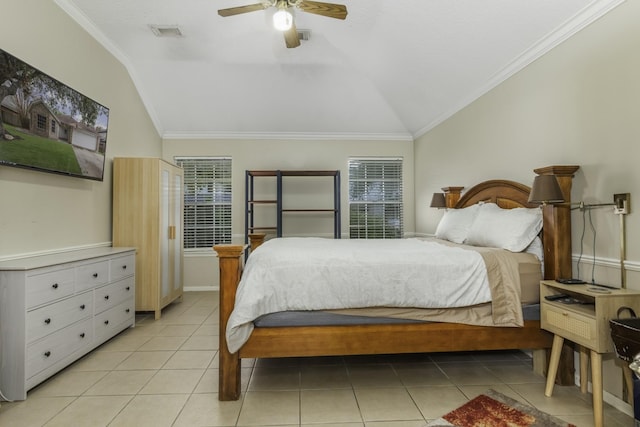 tiled bedroom with ceiling fan, crown molding, and vaulted ceiling