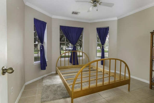 bedroom with ceiling fan, light tile patterned flooring, and crown molding